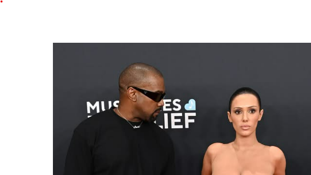 Lip reader decodes what Kanye said to almost-nude wife at Grammys